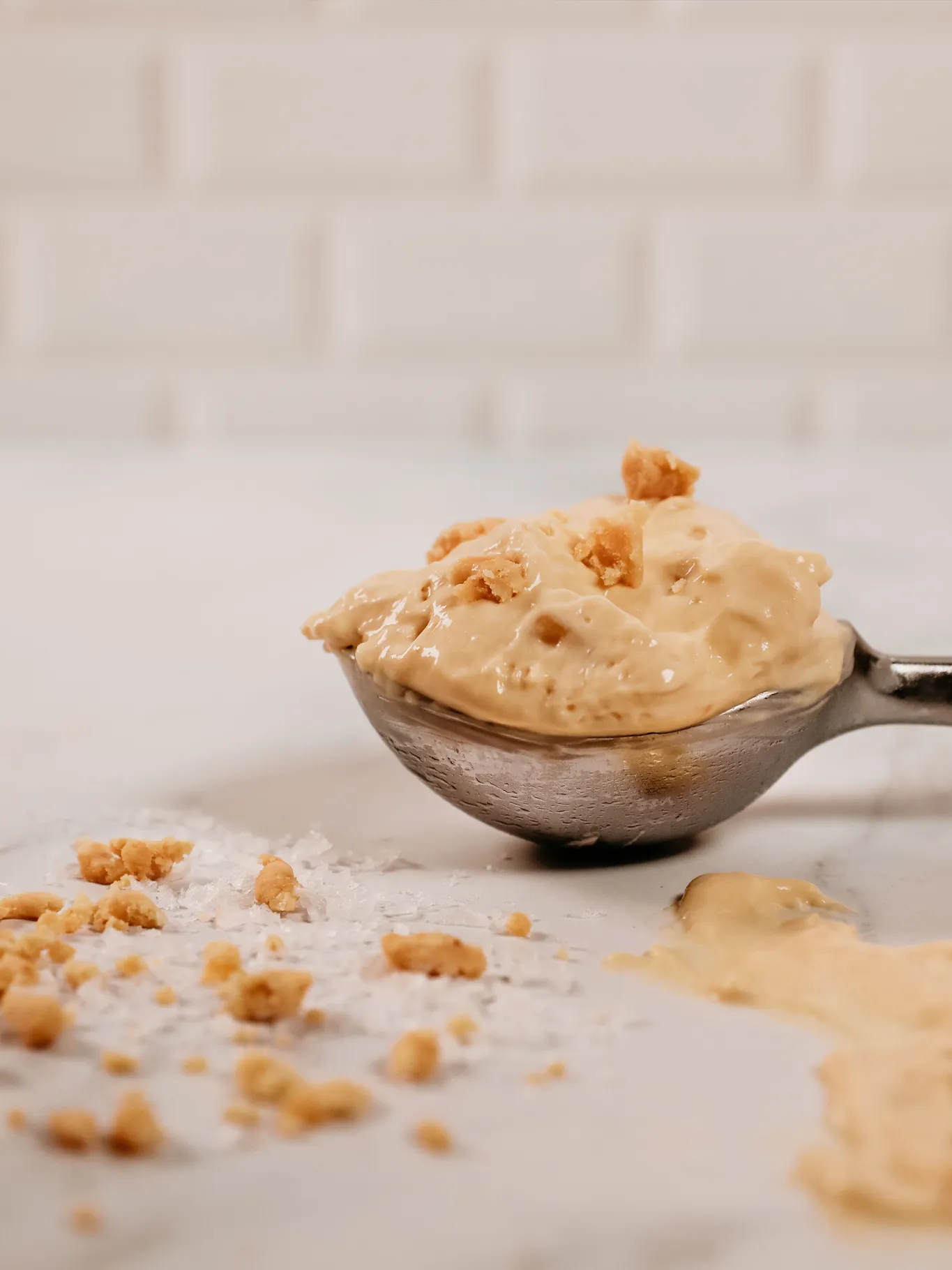 Cookies and Cream SaltedCaramel Fudge Tub Ice-cream on table